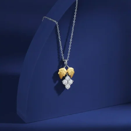 Close-up view of the handcrafted Leaf & Floral Pendant in sterling silver.