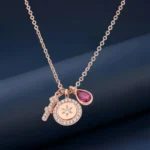 Elegant 925 Silver Rose Gold Charm Pendant with Deep Red Teardrop. Buy original pure silver pendants for women and girls online in India.