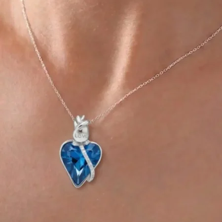 Silver blue stone heart pendant