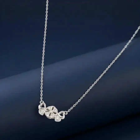 Sparkling Hearts & Flower Pendant with cubic zirconia in silver-tone by The VelvetBox.