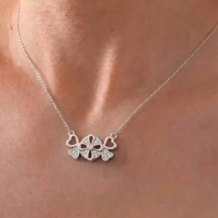 "Sparkling Hearts & Flower Pendant Necklace – Elegant Silver-Tone Charm"