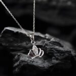 Silver crown pendant Locket with central embedded stones