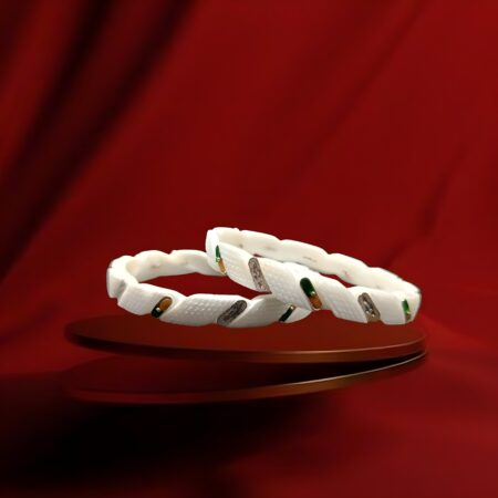 Pair of white bangles with textured surface and embedded multicolor enamel accents in green, Yellow and silver