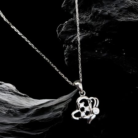 Silver Locket featuring a heart-shaped pendant with a crown design and embedded stones,