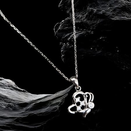 Silver Locket featuring a heart-shaped pendant with a crown design and embedded stones,