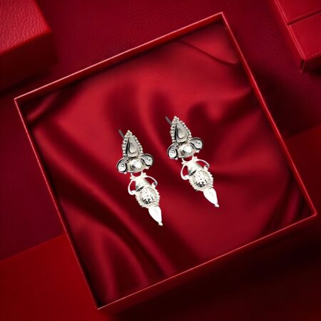 Traditional handcrafted silver earrings with intricate detailing and dangler design