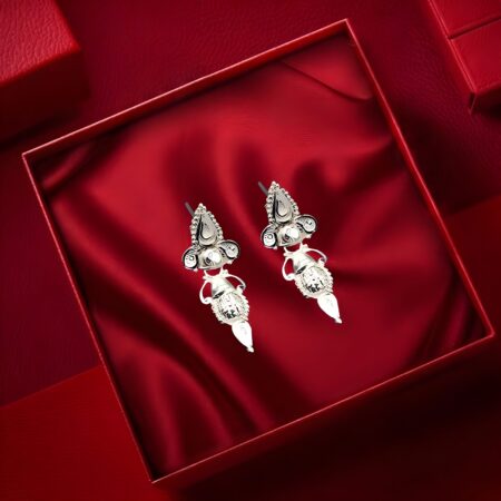 Traditional handcrafted silver earrings with intricate detailing and dangler design