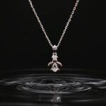 Silver angel-shaped pendant Locket with crystal detailing