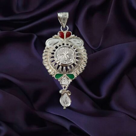 Traditional 925 sterling silver locket with intricate floral design, red and green enamel accents, and dangling charm