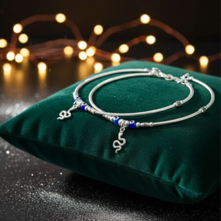 Pair of 925 sterling silver anklets for women with blue evil eye beads and snake charm, featuring elegant oxidized detailing