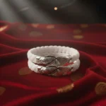 Shop our premium 925 Silver Bridal Sakha. BIS Hallmarked conch-style bangles with stone inlays and silver binding. Perfect for traditional weddings.