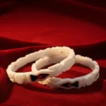 925 Silver sakha bangle online with braided design and colorful accents by The Velvetbox.