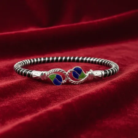 Original Silver Noa Bangles for women in traditional Noya design by The VelvetBox. Caption: Shop Original Silver Noa Bangles with a stylish silver finish at The VelvetBox.