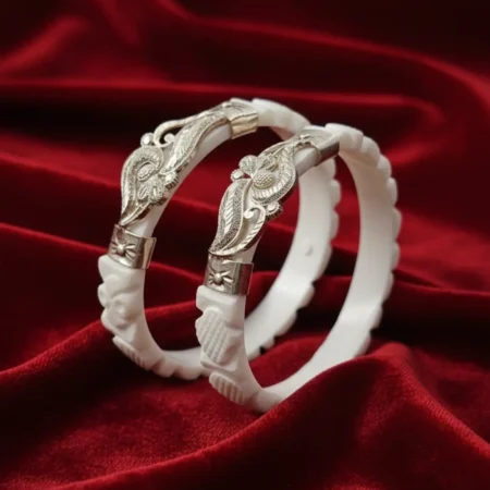 Bengali Marriage Silver Sakha featuring a silver elephant motif and blue-green teardrop gemstones by The Velvet Box.