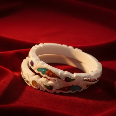 Wedding Special Bengali Sakha featuring a silver elephant motif and blue-green teardrop gemstones by The Velvet Box.