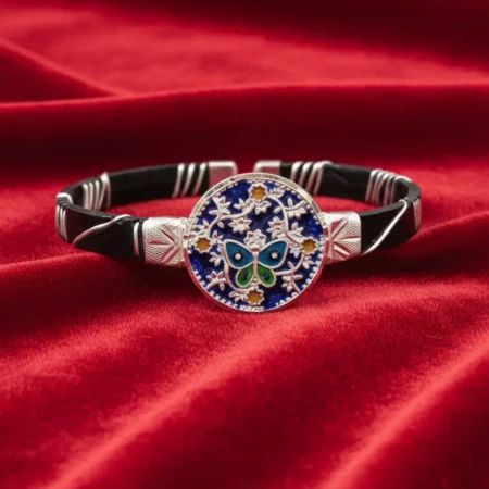 Original Silver Noa featuring a handcrafted butterfly blue enamel design by The VelvetBox.