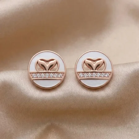Rose Gold Heart & Mother of Pearl Stud Earrings in 925 Silver | The Velvet Box