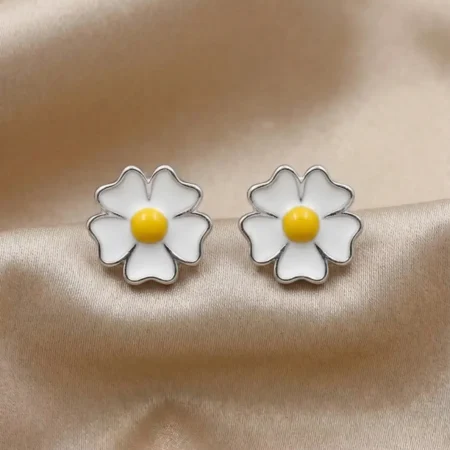 White Daisy Enamel Stud Earrings in 925 Silver | The Velvet Box