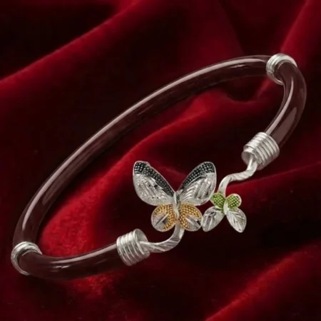 Noya Bangle with Dual-Tone Butterfly Motif